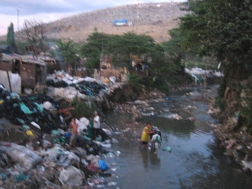 collecting rubbish from river.jpg